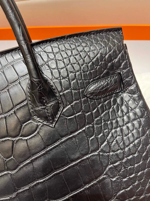 Side view of contemporary structured handbag