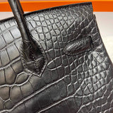 Side view of contemporary structured handbag