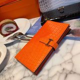 Side view of sleek structured handbag