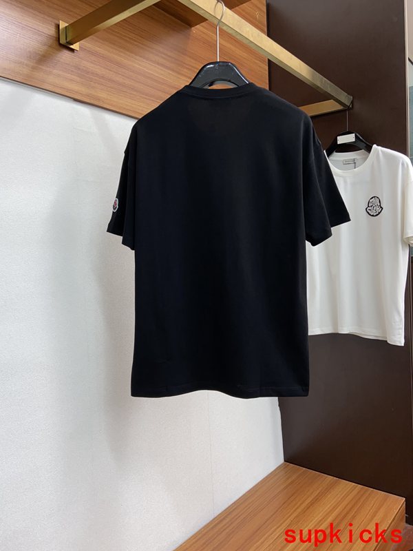 Close-up detail shot of Moncler luxury clothing with relaxed-fit cut
