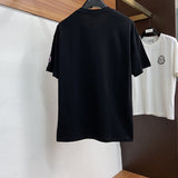 Close-up detail shot of Moncler luxury clothing with relaxed-fit cut