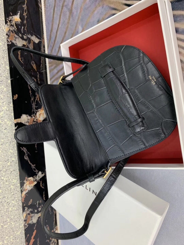 Back view of chic statement women's handbag – women's designer-style accessory