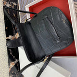 Back view of chic statement women's handbag – women's designer-style accessory