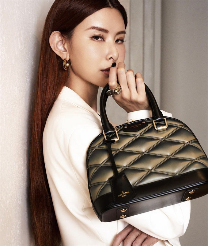  Sleek structured bag carried on shoulder 46