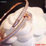 Front view of Cartier unisex jewelry piece