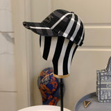 Close-up detail view of Burberry unisex cap