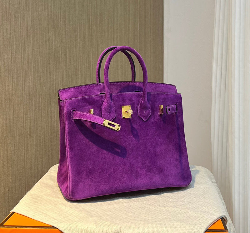 Side view of classic structured handbag