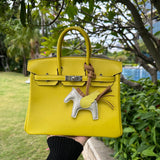 Side view of fluid structured handbag