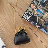 Ziva's Charm handbag – side angle view (11.5cm*10cm*5.5cm)