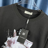 Close-up detail shot of Givenchy luxury clothing with monogram-inspired silhouette