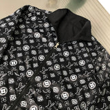 Close-up detail shot of Louis Vuitton luxury clothing with tailored silhouette