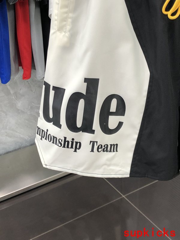 Flat lay presentation of Rhude luxury clothing with streetwear-inspired cut