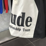 Flat lay presentation of Rhude luxury clothing with streetwear-inspired cut