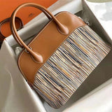 Fluid handbag styled for everyday wear