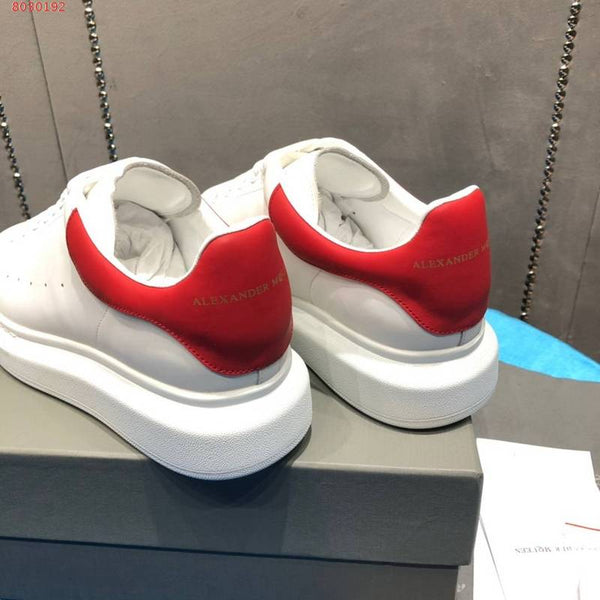 Alexander McQueen neutral cream luxury sneakers view 4 minimalist modern build