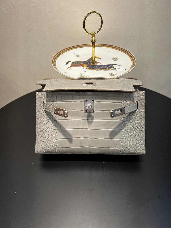 Side view of curated structured handbag