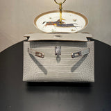 Side view of curated structured handbag