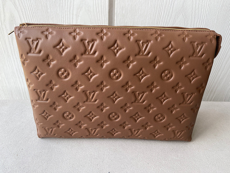 Styled lifestyle shot of structured statement women's handbag – women's luxury accessory