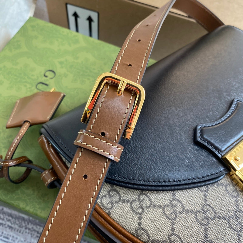Handle and strap detail of statement signature women's handbag – women's luxury handbag