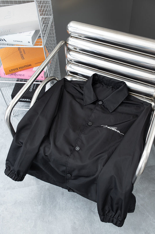 Close-up detail shot of Louis Vuitton luxury clothing with relaxed-fit cut