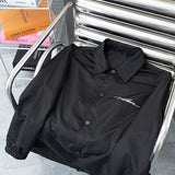 Close-up detail shot of Louis Vuitton luxury clothing with relaxed-fit cut