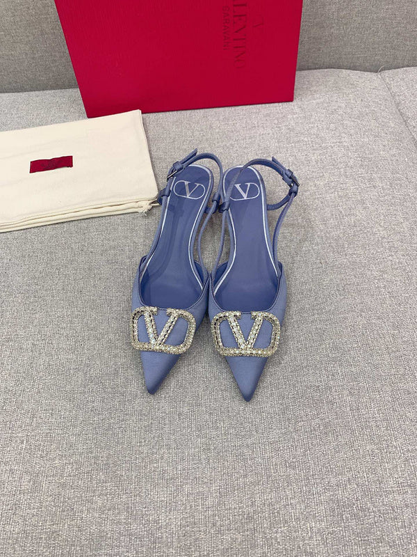 Three-quarter angle view of Valentino Garavani luxury piece style No.207