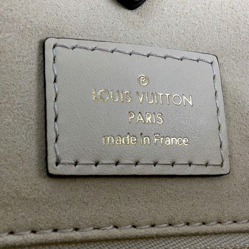 Back view of classic polished women's handbag – women's everyday handbag