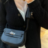 Side view of structured structured handbag