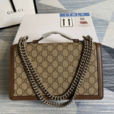 Front view of modern sleek women's handbag – women's luxury accessory