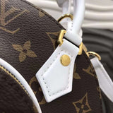 Handle and strap detail of signature everyday-luxe women's handbag – women's luxury handbag