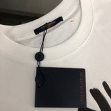 Full styled look of Louis Vuitton cotton t-shirt with label-forward styling