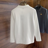 Side profile of Louis Vuitton luxury clothing with label-forward styling