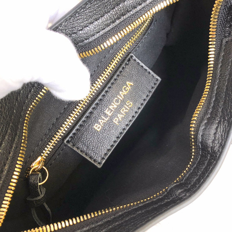 Side profile of statement structured women's handbag – women's statement bag