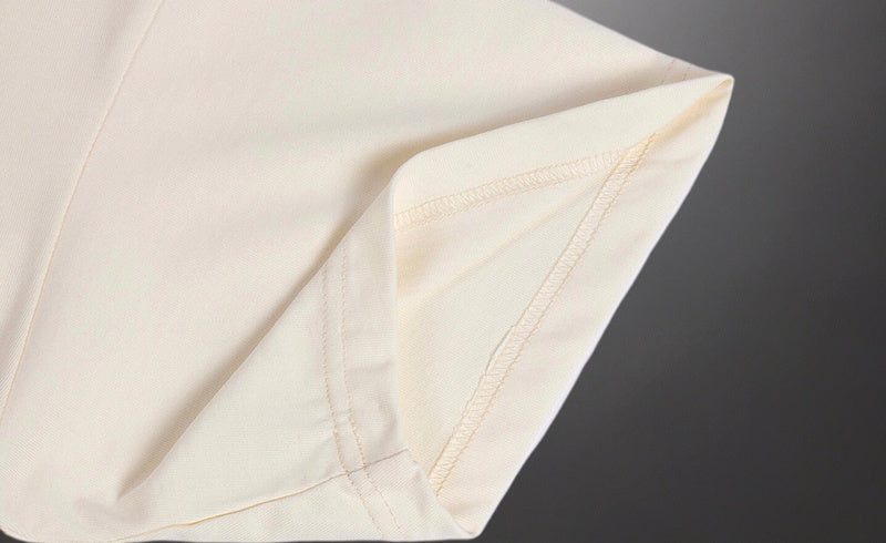 Side profile of Gucci luxury clothing with signature branding