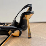 Three-quarter angle view of Saint Laurent luxury piece style No.009