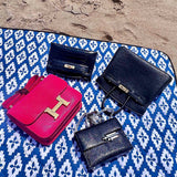 Side view of refined structured handbag