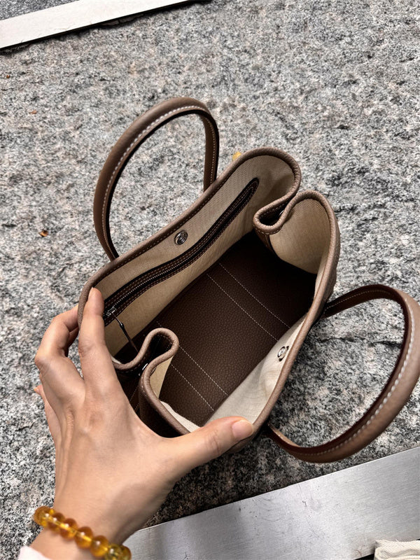 Close-up detail of statement bag design