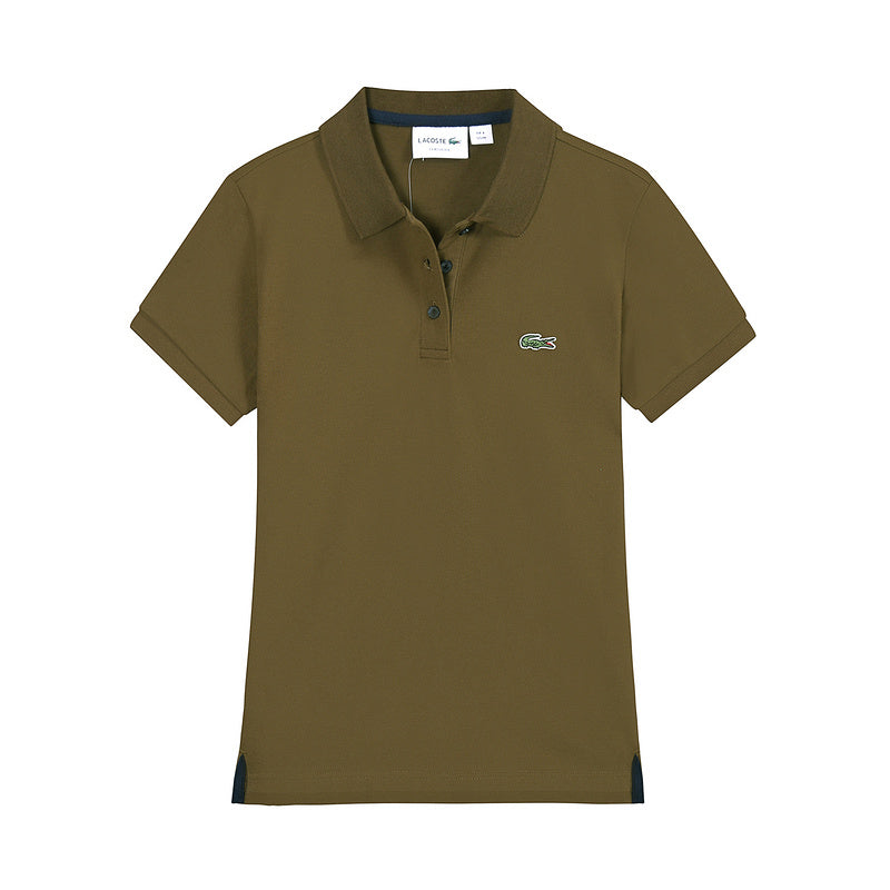 Flat lay presentation of Lacoste luxury clothing with signature branding