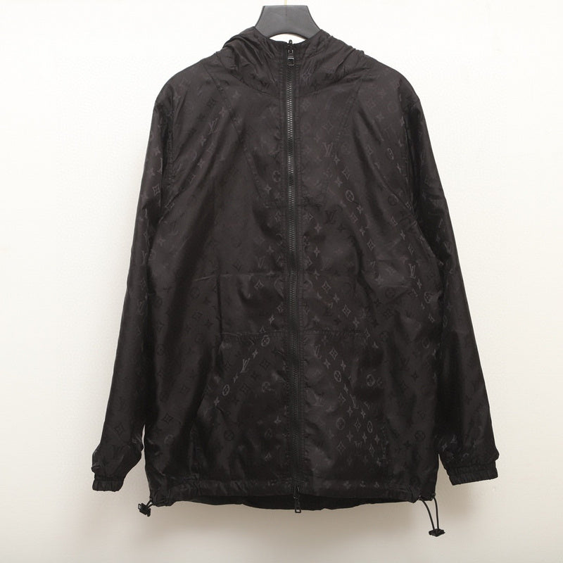 Flat lay presentation of Louis Vuitton luxury clothing with logo-detail design