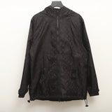 Flat lay presentation of Louis Vuitton luxury clothing with logo-detail design
