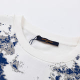 Back view of Louis Vuitton luxury clothing with signature branding