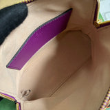 Side profile of signature sleek women's handbag – women's designer-style accessory