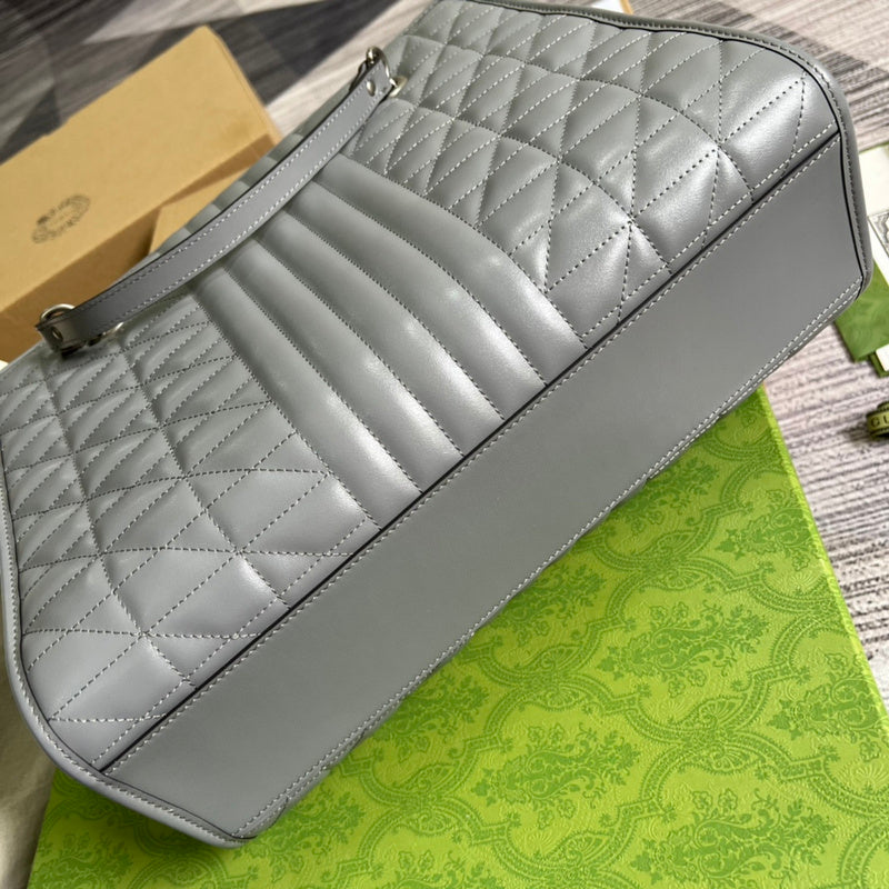 Side profile of statement signature women's handbag – women's premium purse
