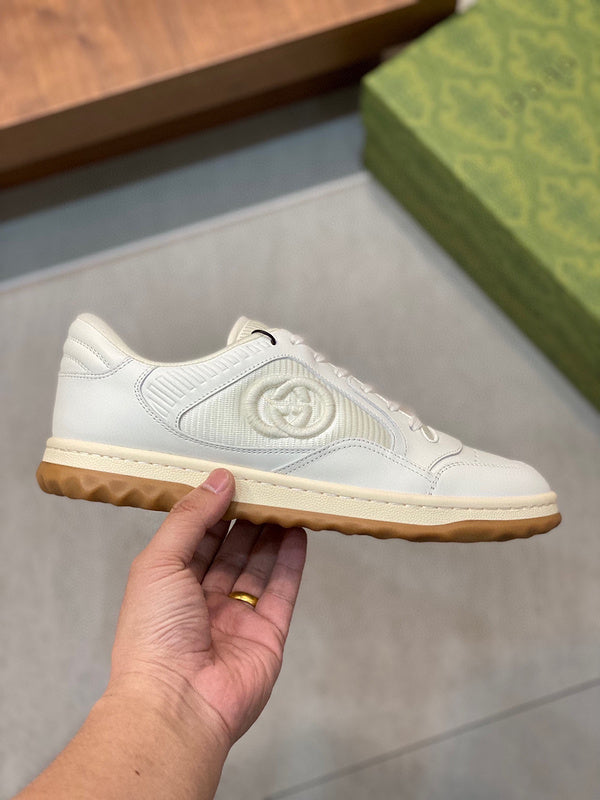 Gucci Designer sneakers in bold contrast streetwear statement look front view
