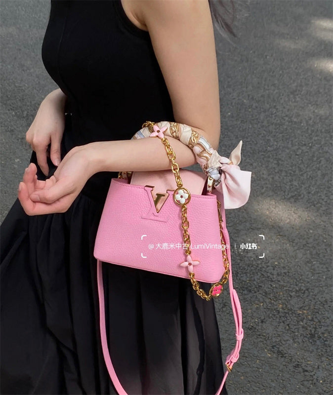  Statement crossbody bag carried on shoulder