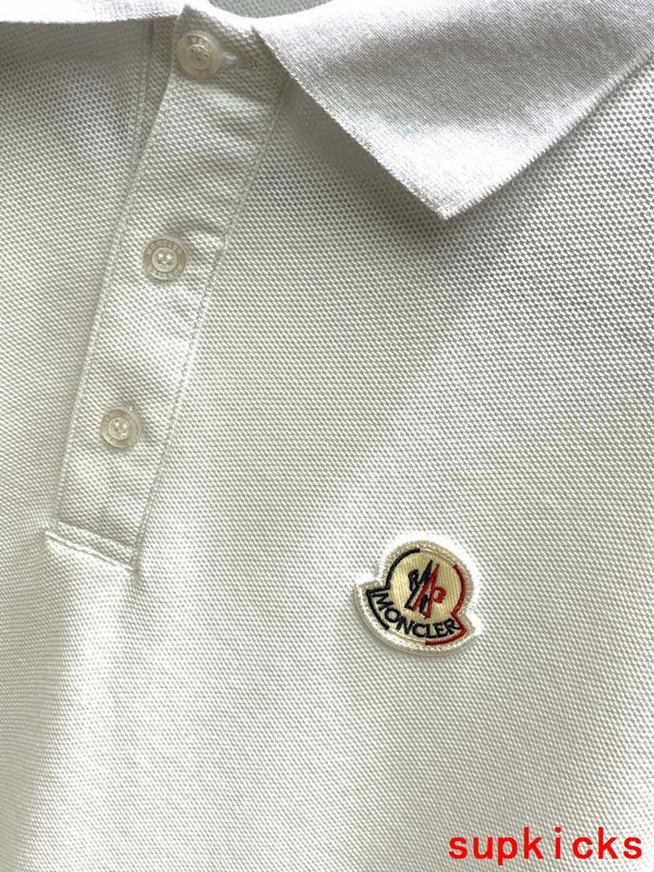 Back view of Moncler luxury clothing with signature branding