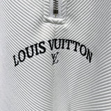 Full styled look of Louis Vuitton luxury clothing with monogram-inspired silhouette