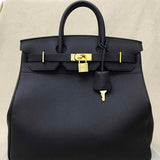 Side view of considered structured handbag
