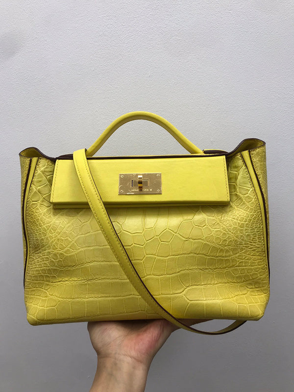 Side view of elegant structured handbag