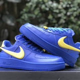 Side profile of Nike all-black sneakers low-top design
